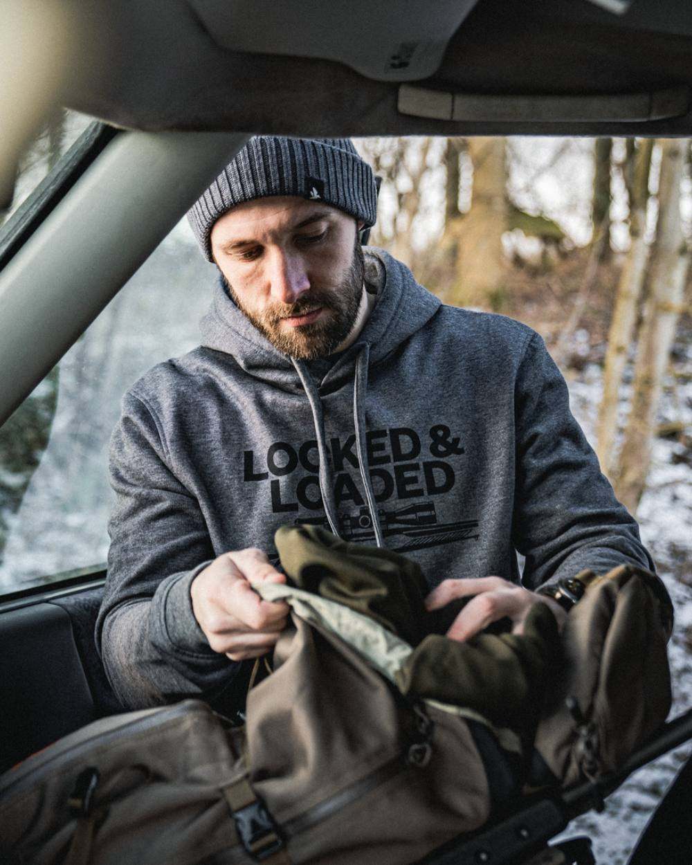 Grey Melange Coloured Seeland Loaded Hoodie on outdoor background 