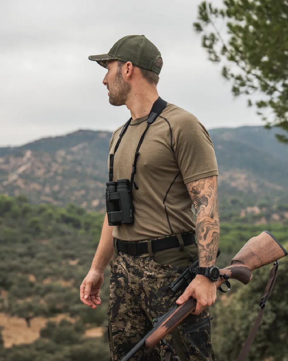 Covert Green Coloured Seeland Mens Apex Merino T-Shirt on mountain background 