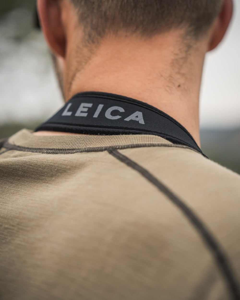 Covert Green Coloured Seeland Mens Apex Merino T-Shirt on mountain background 