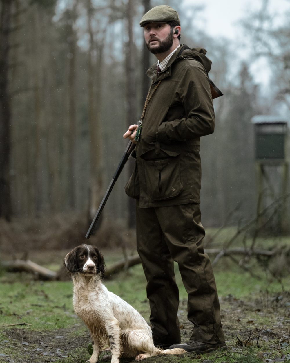 Shaded Olive coloured Seeland Mens Buckthorn Duro Overtrousers on forest background 