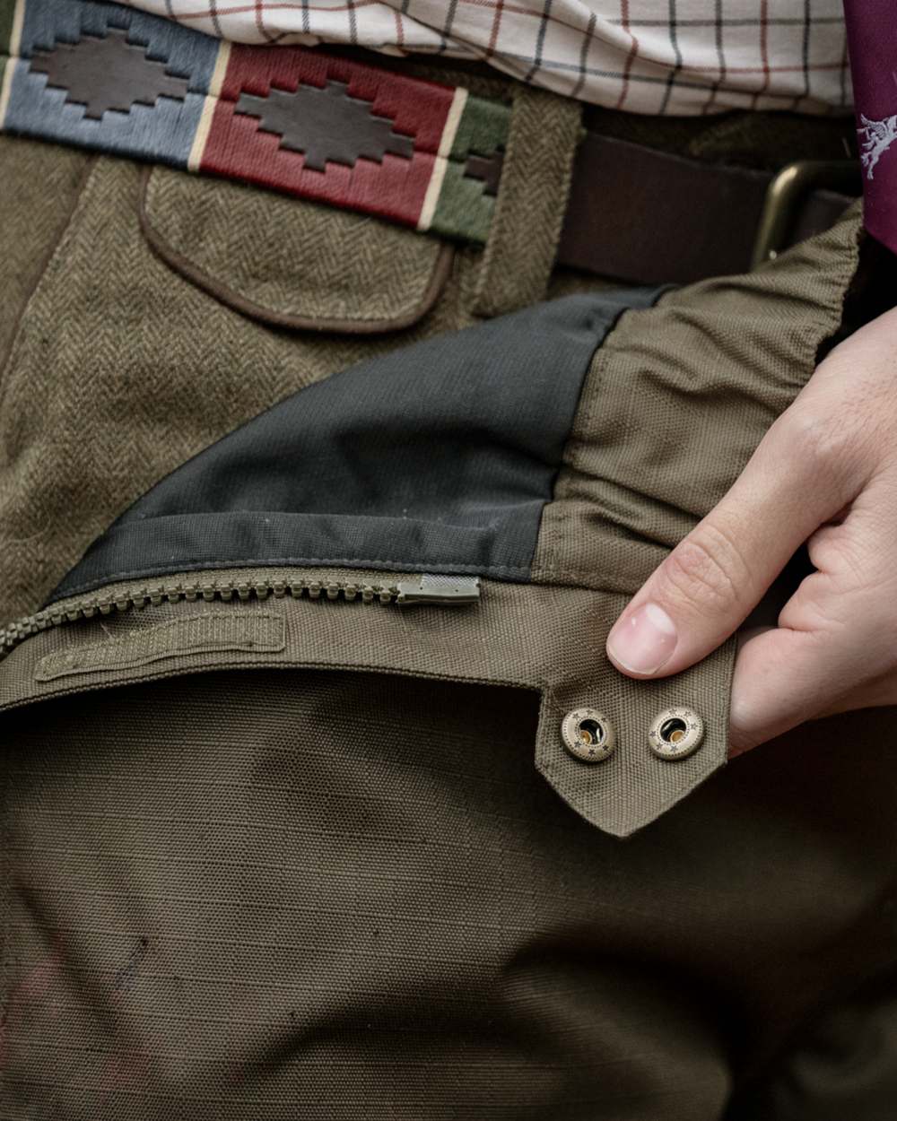 Shaded Olive coloured Seeland Mens Buckthorn Duro Overtrousers on forest background 