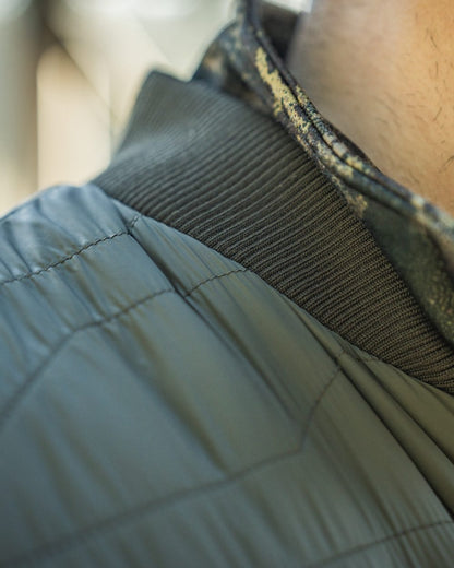 Grape Leaf Coloured Seeland Mens Celsius Heat Liner Waistcoat on outdoor background 