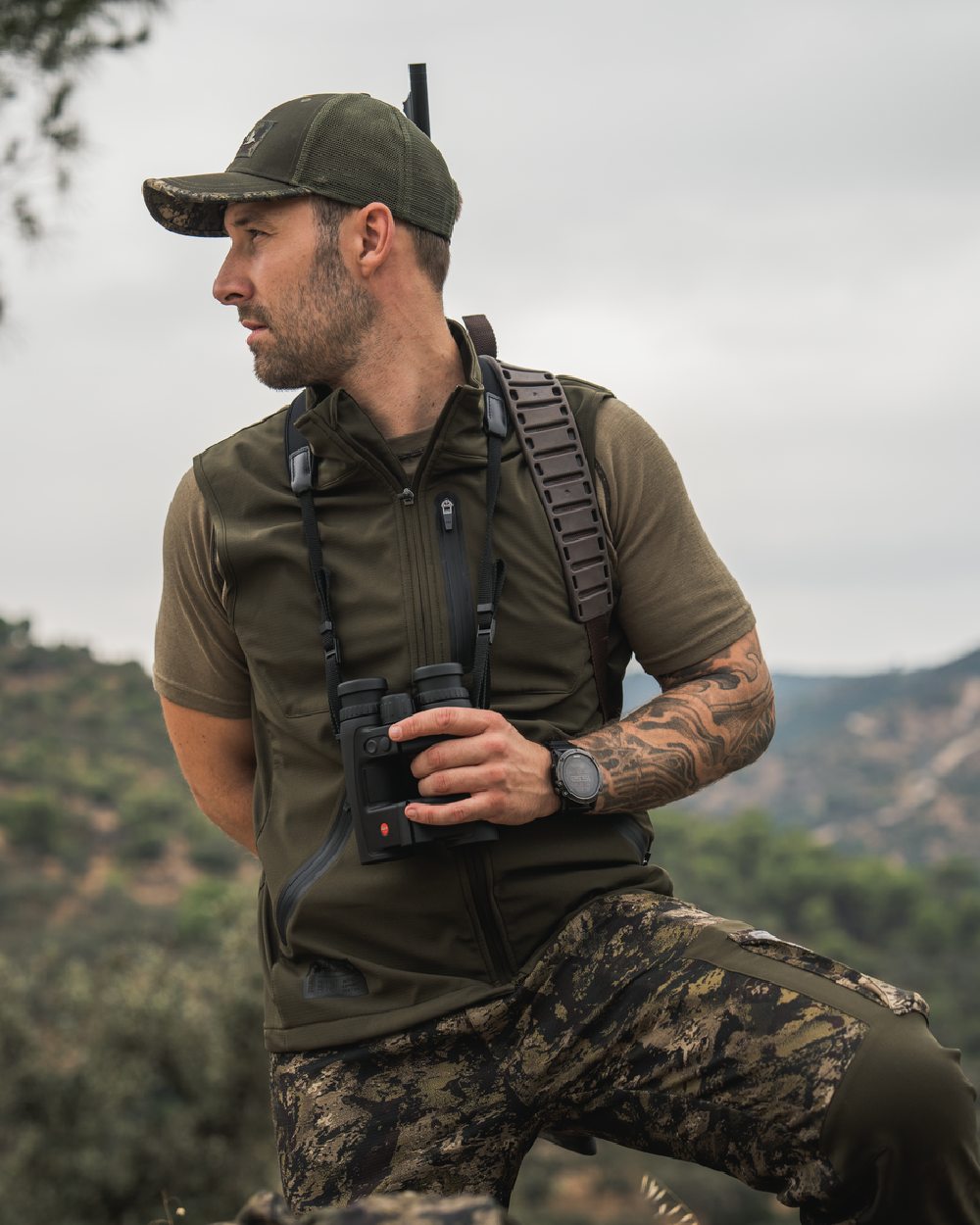 Pine Green Coloured Seeland Mens Chaser Aero Waistcoat on mountain background 
