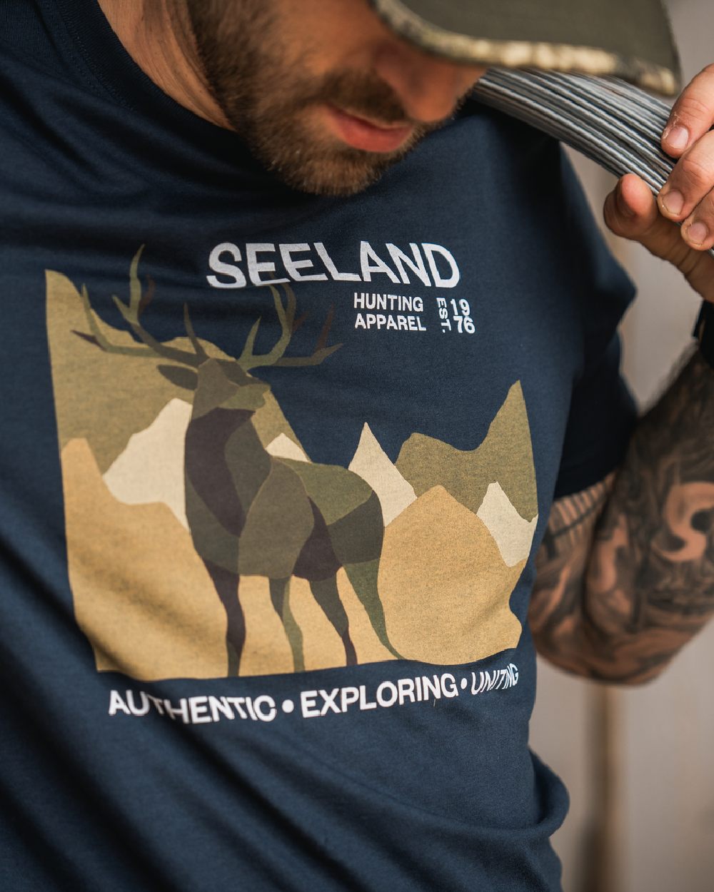 Dark Blue Coloured Seeland Mens Fragment T-Shirt on workshop background 