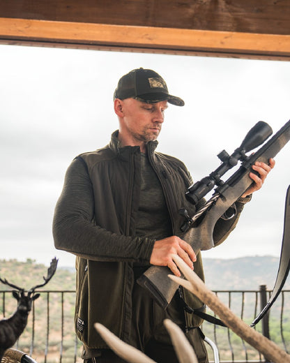 Pine Green Coloured Seeland Mens Gale Fleece Waistcoat on outdoor background 