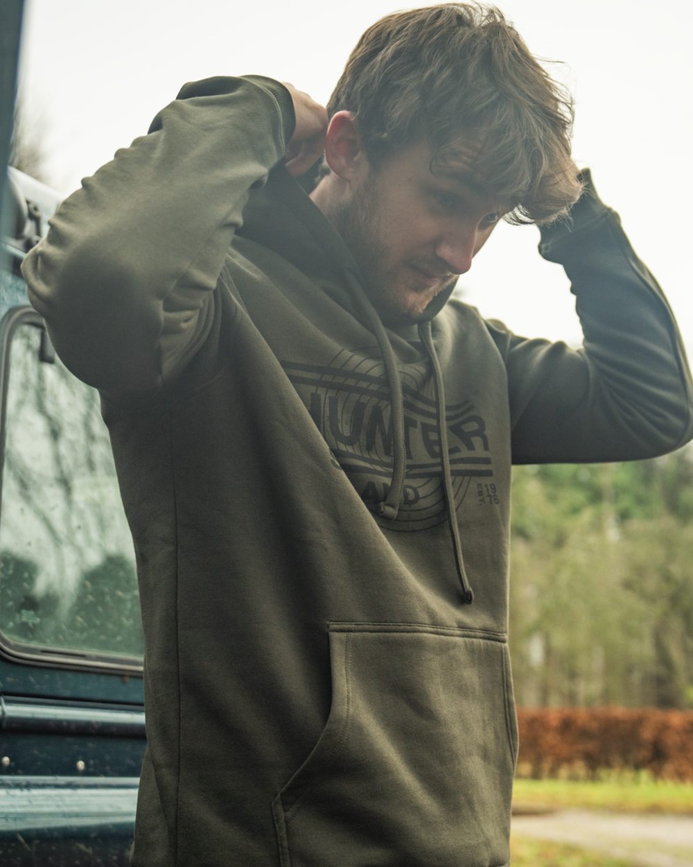 Pine Green Coloured Seeland Mens On Point Hoodie on outdoor background 