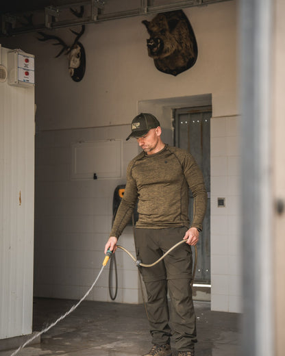 Military Olive Melange Coloured Seeland Peak T-shirt on Indoor Background
