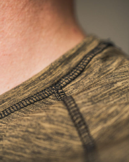 Military Olive Melange Coloured Seeland Peak T-shirt on Blurry Background
