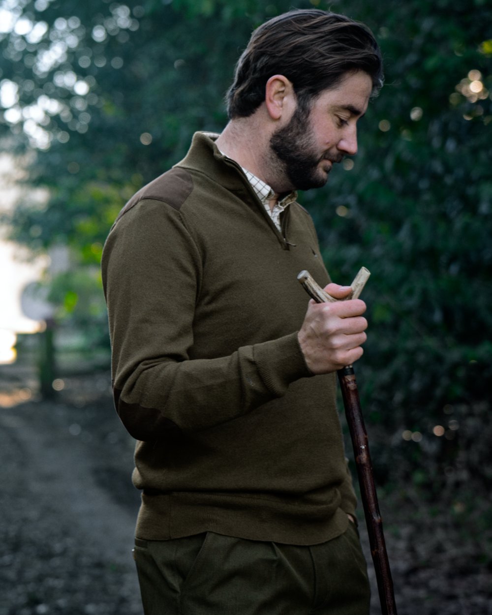 Light Pine coloured Seeland Mens Pine Half Zip Sweater on forest background 