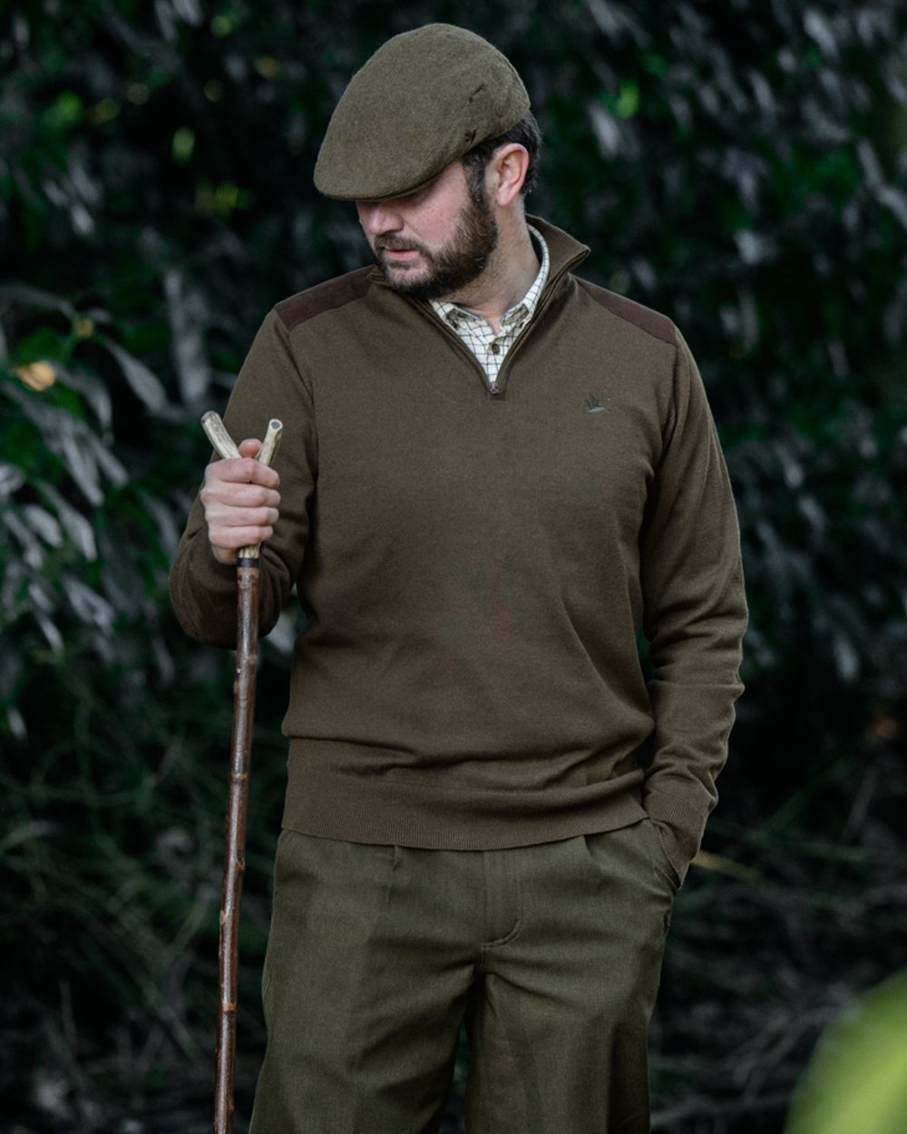 Light Pine coloured Seeland Mens Pine Half Zip Sweater on forest background 