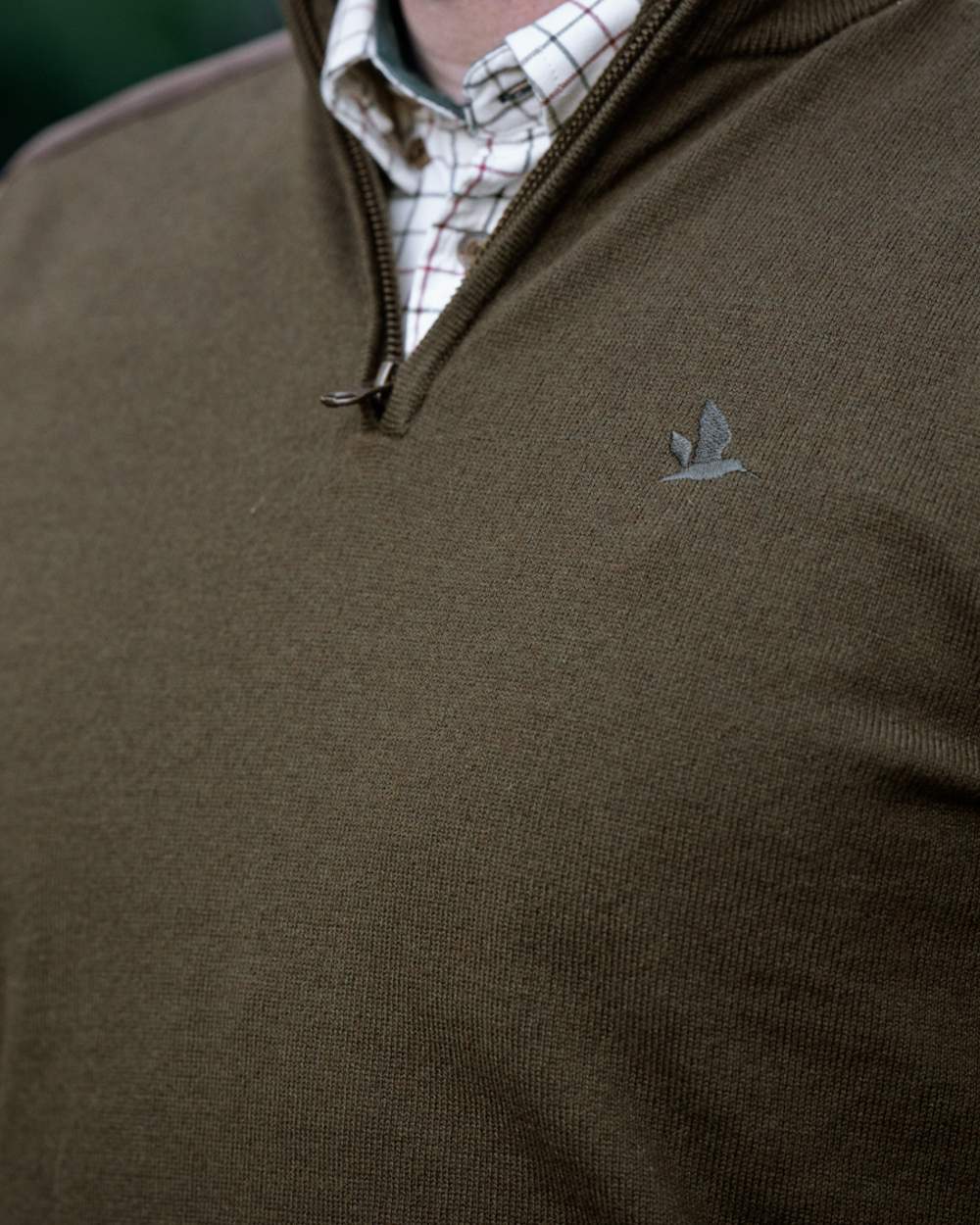 Light Pine coloured Seeland Mens Pine Half Zip Sweater on forest background 