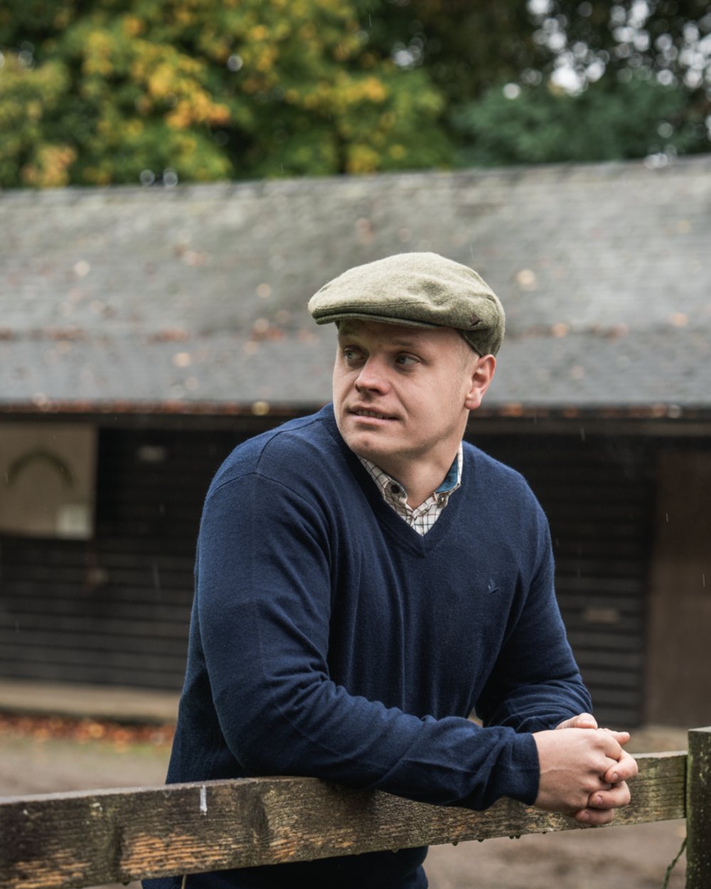 Dark Sapphire Coloured Seeland Mens Pine V-Neck Pullover on outdoor background 