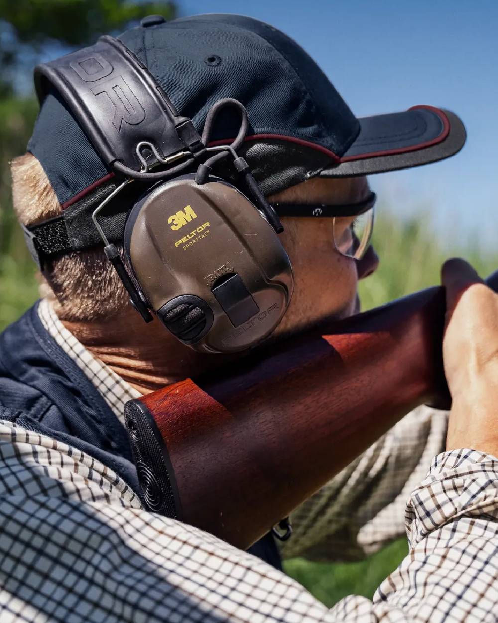 Classic Blue Coloured Seeland Mens Skeet Cap on outdoor background 