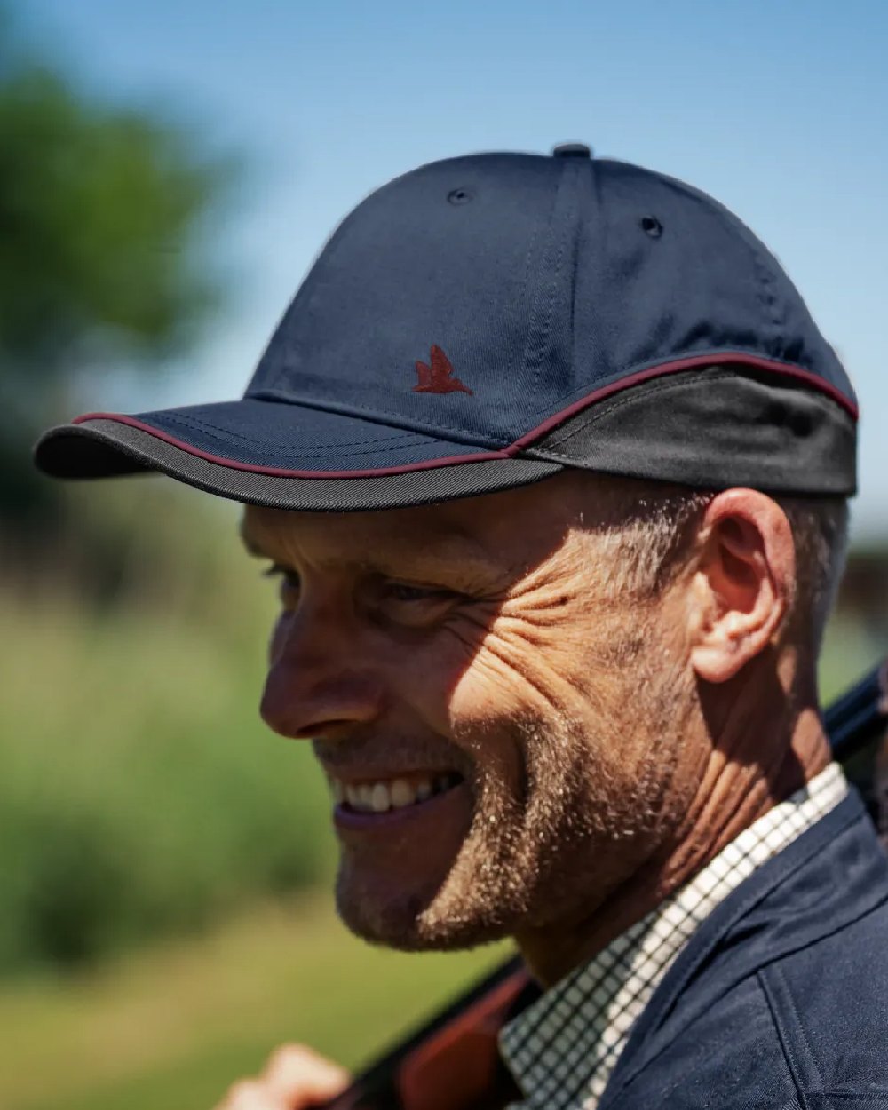 Classic Blue Coloured Seeland Mens Skeet Cap on outdoor background 