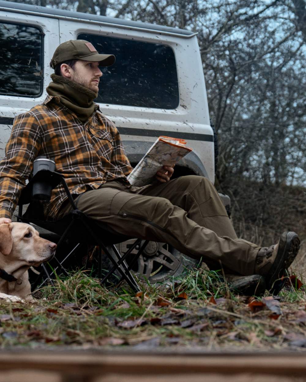 Pine Green Grizzly Brown coloured Seeland Mens Spruce Membrane Trousers on forest background 
