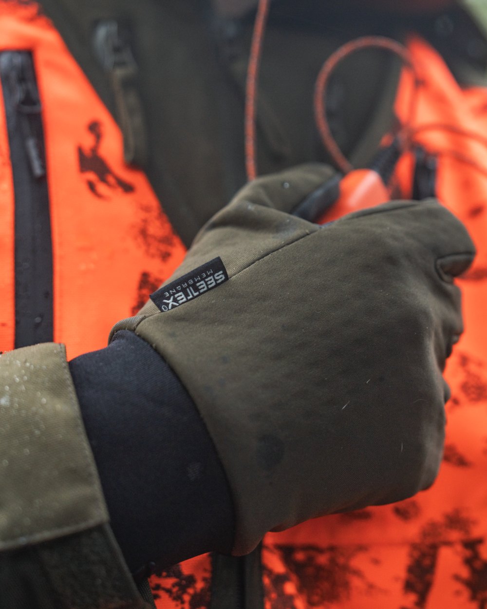 Pine Green Coloured Seeland Mens Target Gloves on outdoor background 