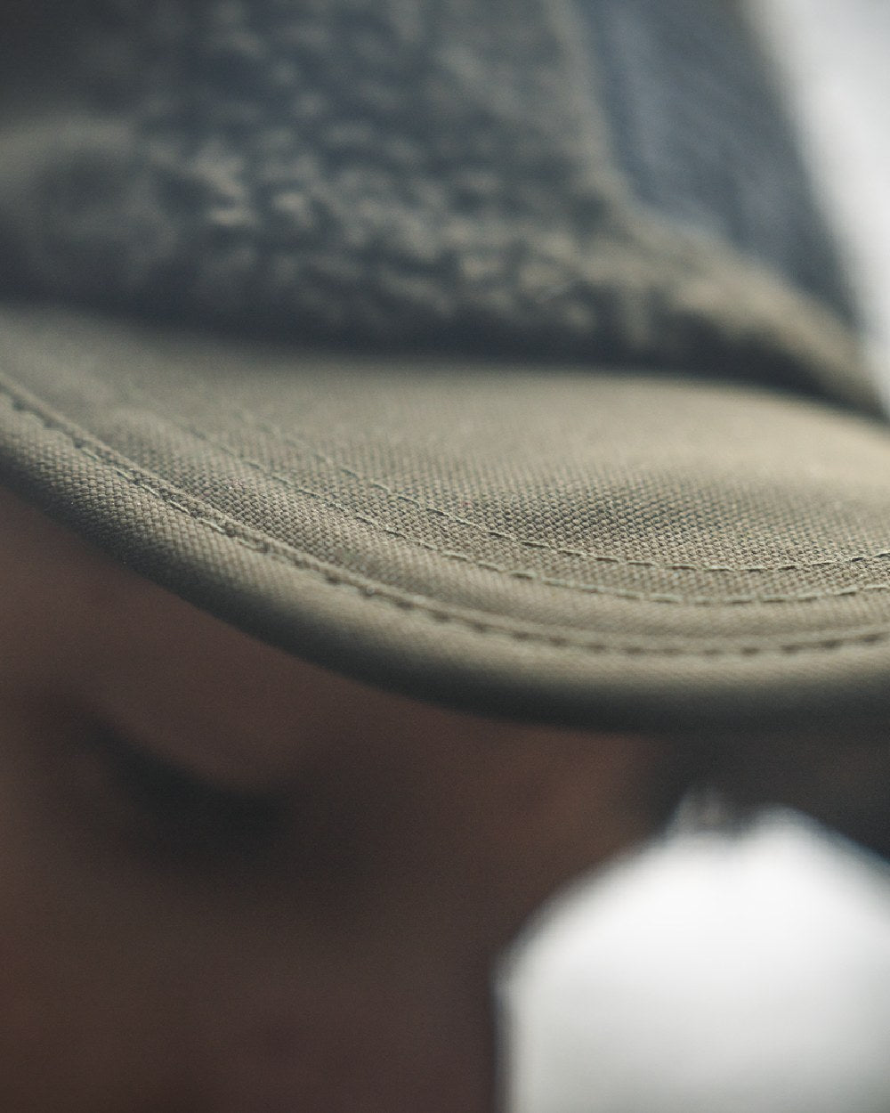 Pine Green coloured Seeland Mens Teddy Fold Down Cap on fog background 