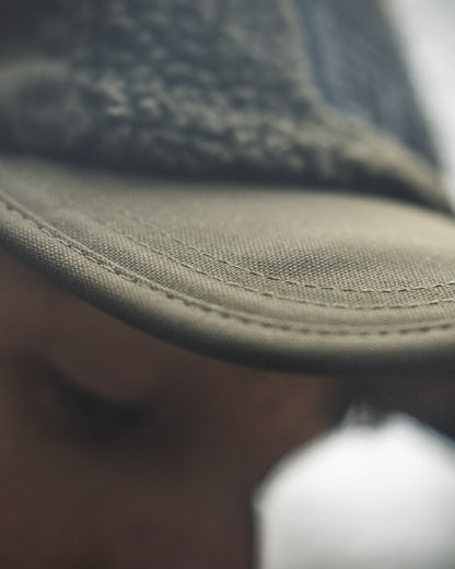 Pine Green coloured Seeland Mens Teddy Fold Down Cap on fog background 