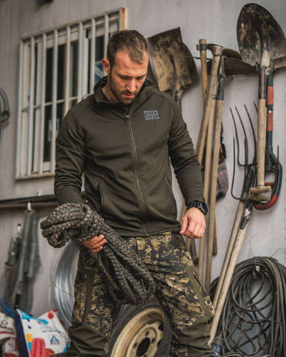 Pine Green Coloured Seeland Tidal Fleece Jacket on Indoor Background
