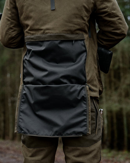 Grizzly Brown coloured Seeland Mens Ultimo Jacket on forest background 