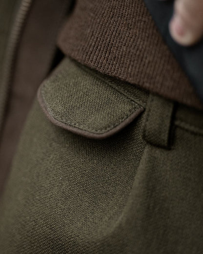 Shaded Olive coloured Seeland Mens Woodcock Royale Breeks on forest background 