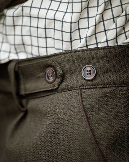 Shaded Olive coloured Seeland Mens Woodcock Royale Breeks on forest background 