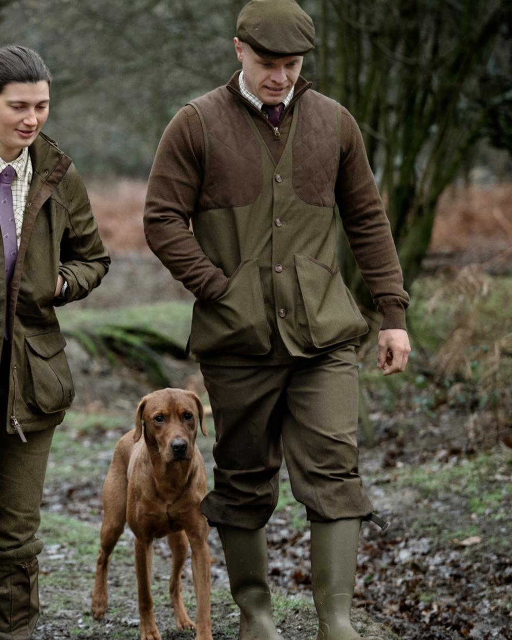 Shaded Olive coloured Seeland Mens Woodcock Royale Breeks on forest background 