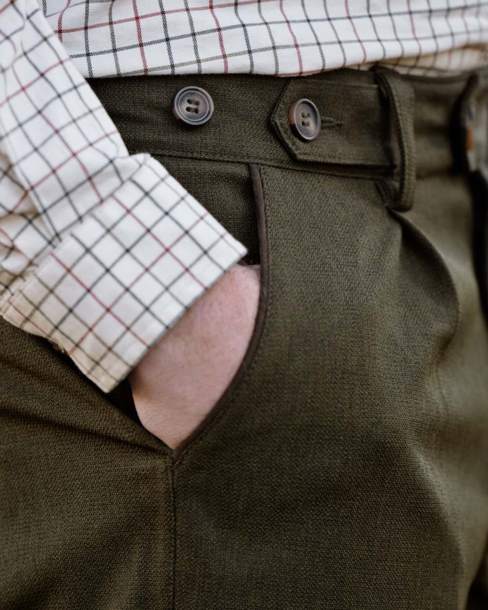 Shaded Olive coloured Seeland Mens Woodcock Royale Trousers on forest background 