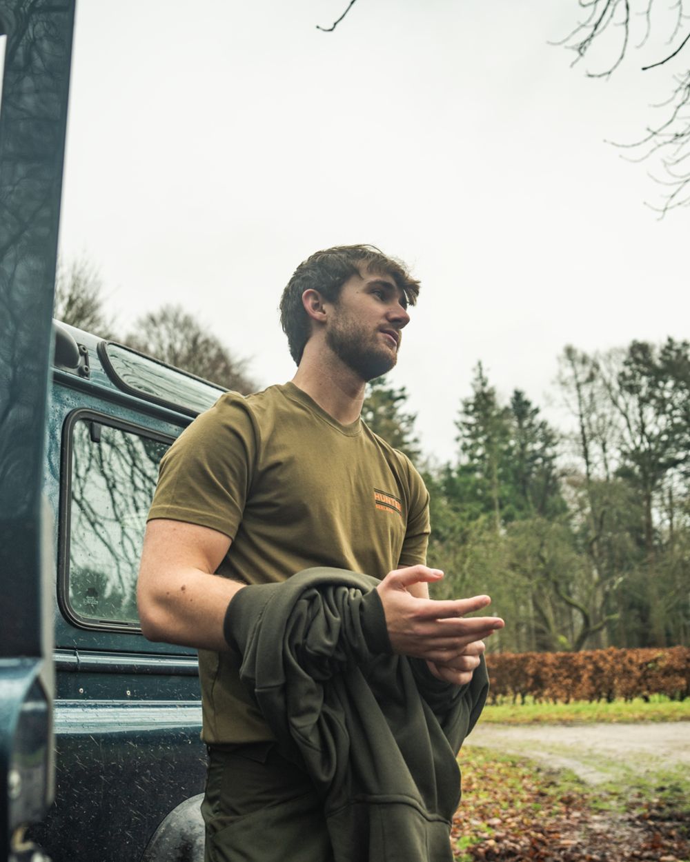 Military Olive Coloured Seeland On Point T-Shirt on outdoor background 