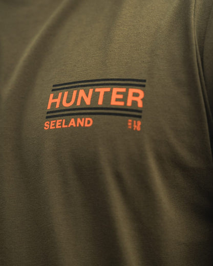 Military Olive Coloured Seeland On Point T-Shirt on outdoor background 