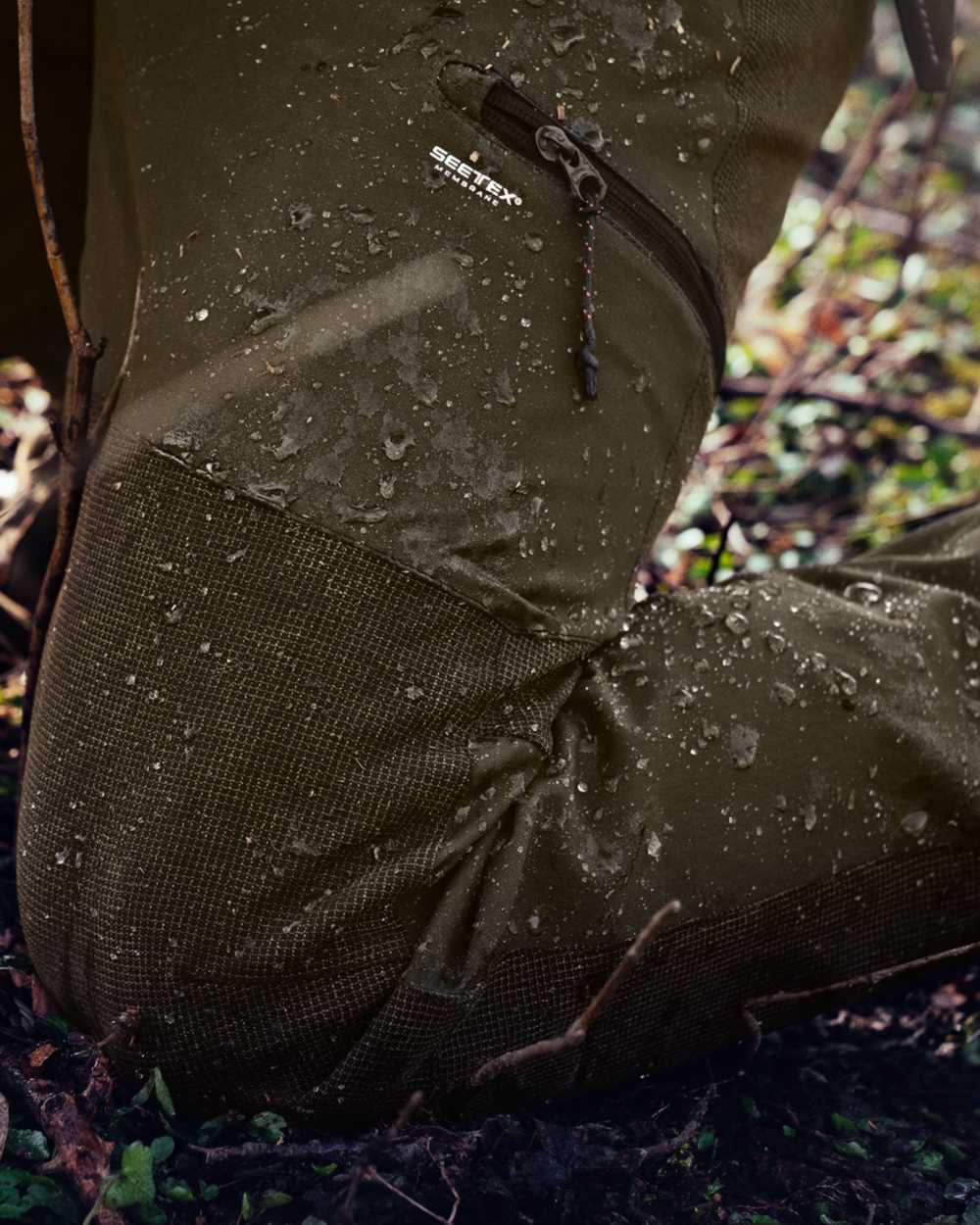 Pine Green Coloured Seeland Outdoor Membrane Trousers on outdoor background 