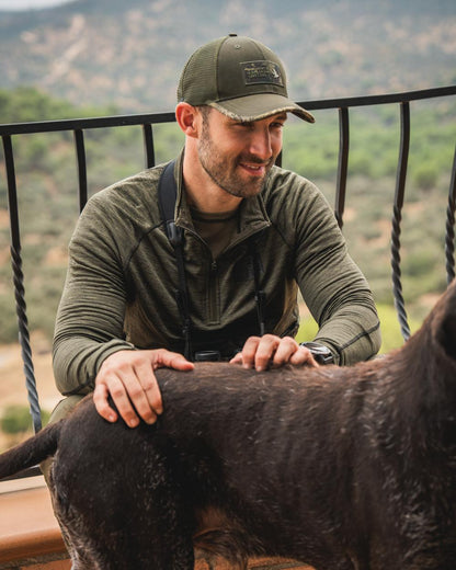 Pine Green Melange Coloured Seeland Peak Half Zip on outdoor background 