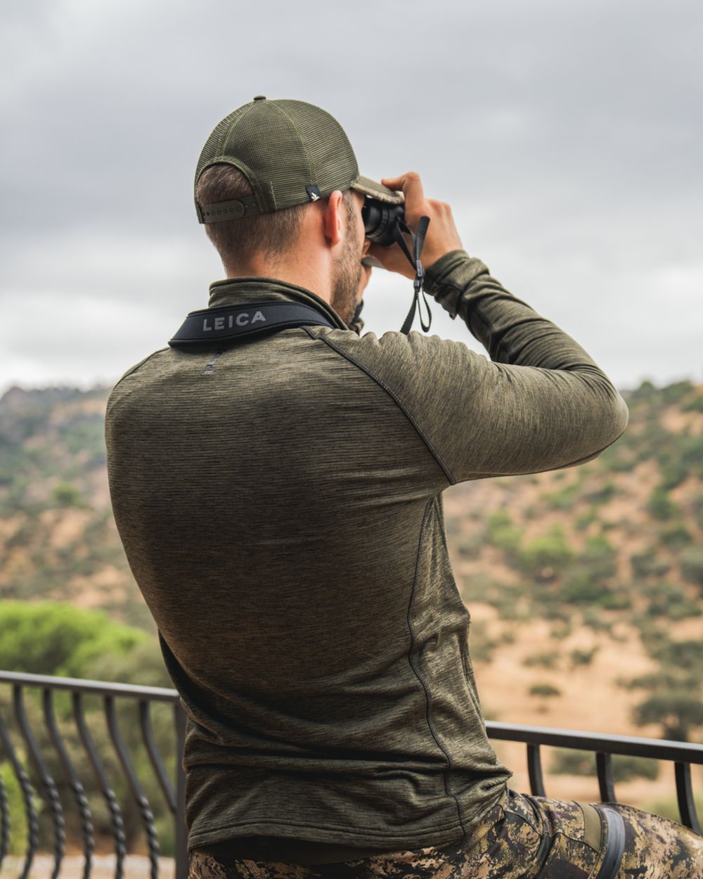 Pine Green Melange Coloured Seeland Peak Half Zip on outdoor background 