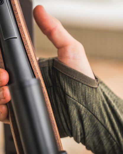 Pine Green Melange Coloured Seeland Peak Half Zip on outdoor background 