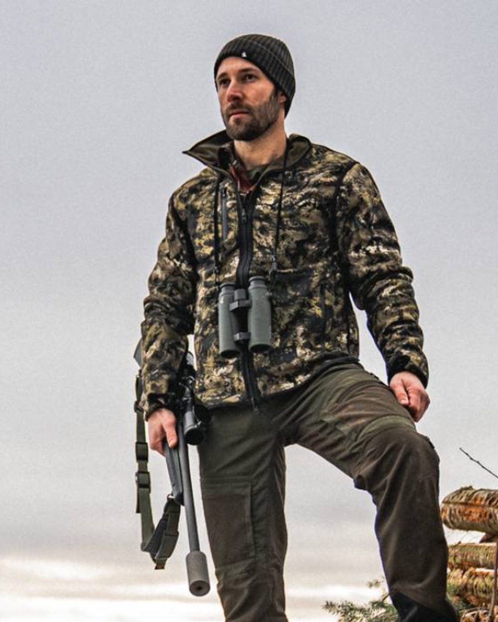 Light Pine InVis Green Coloured Seeland Rogue Reversible Fleece Jacket on sky background 