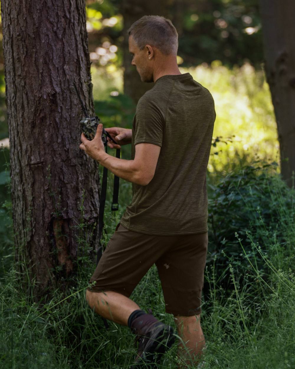 Pine Green Coloured Seeland Rowan Stretch Shorts on outdoor background 