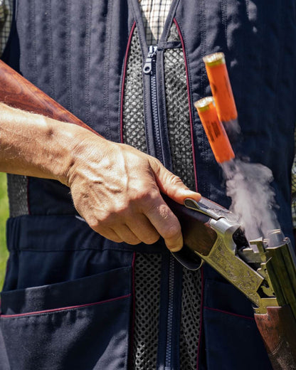 Classic Blue coloured Seeland Skeet II Waistcoat on forest background 