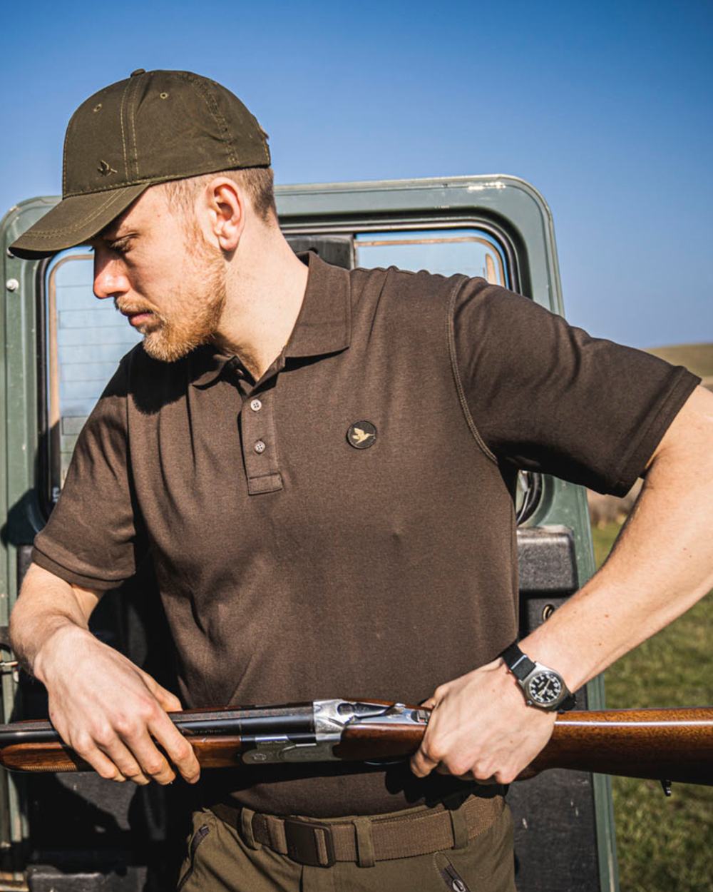 Brown Coloured Seeland Skeet Polo Shirt on outdoor background 