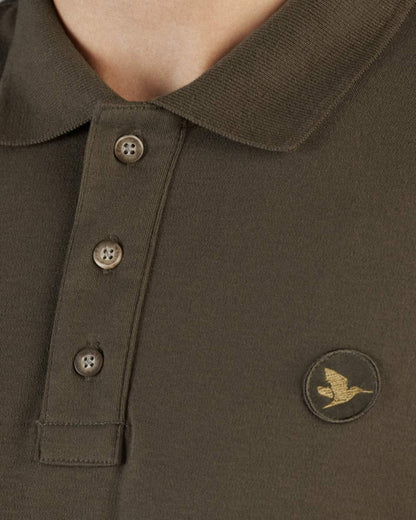 Green Coloured Seeland Skeet Polo Shirt on White background 