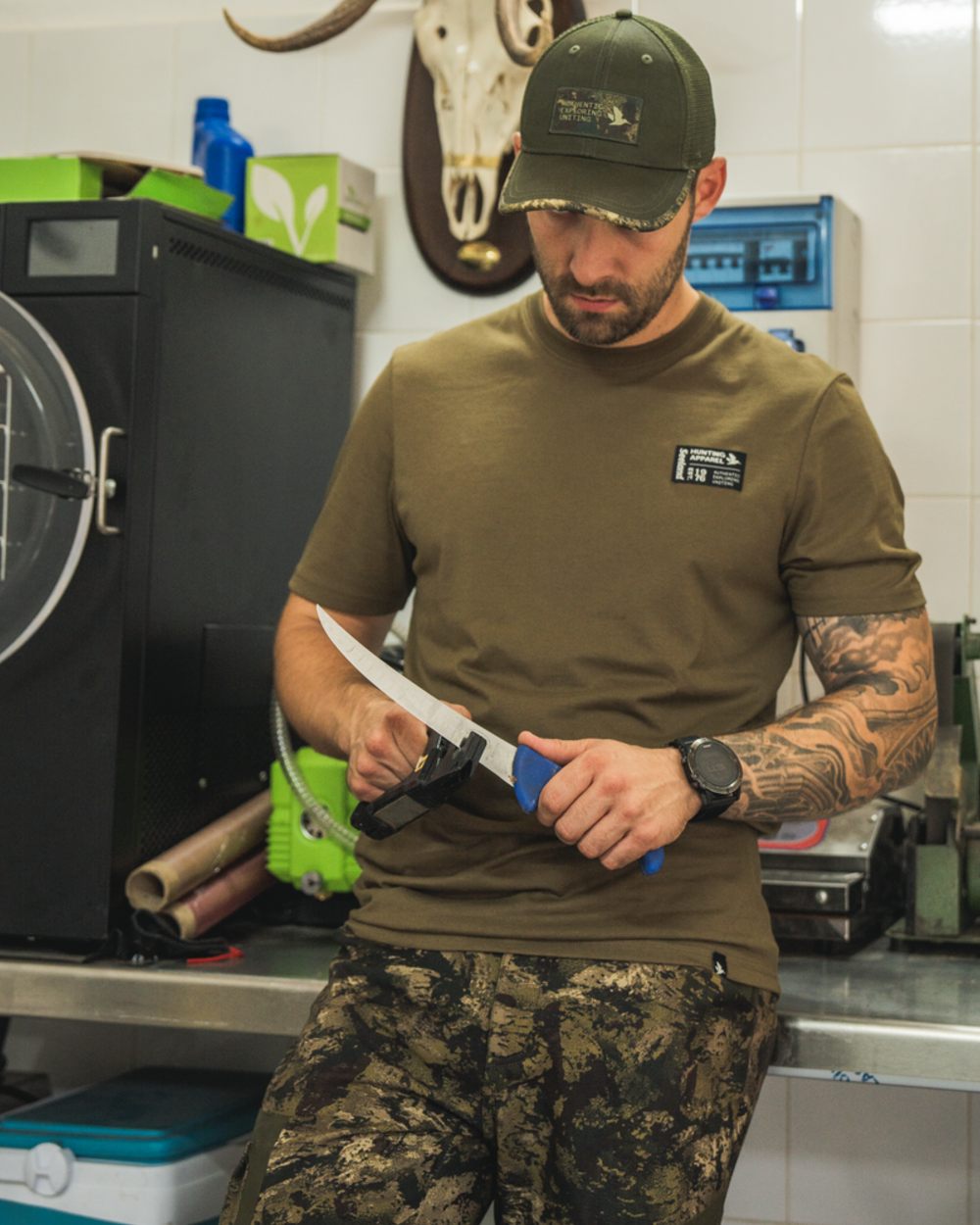 Military Olive Coloured Seeland Striker T-Shirt on indoor background 