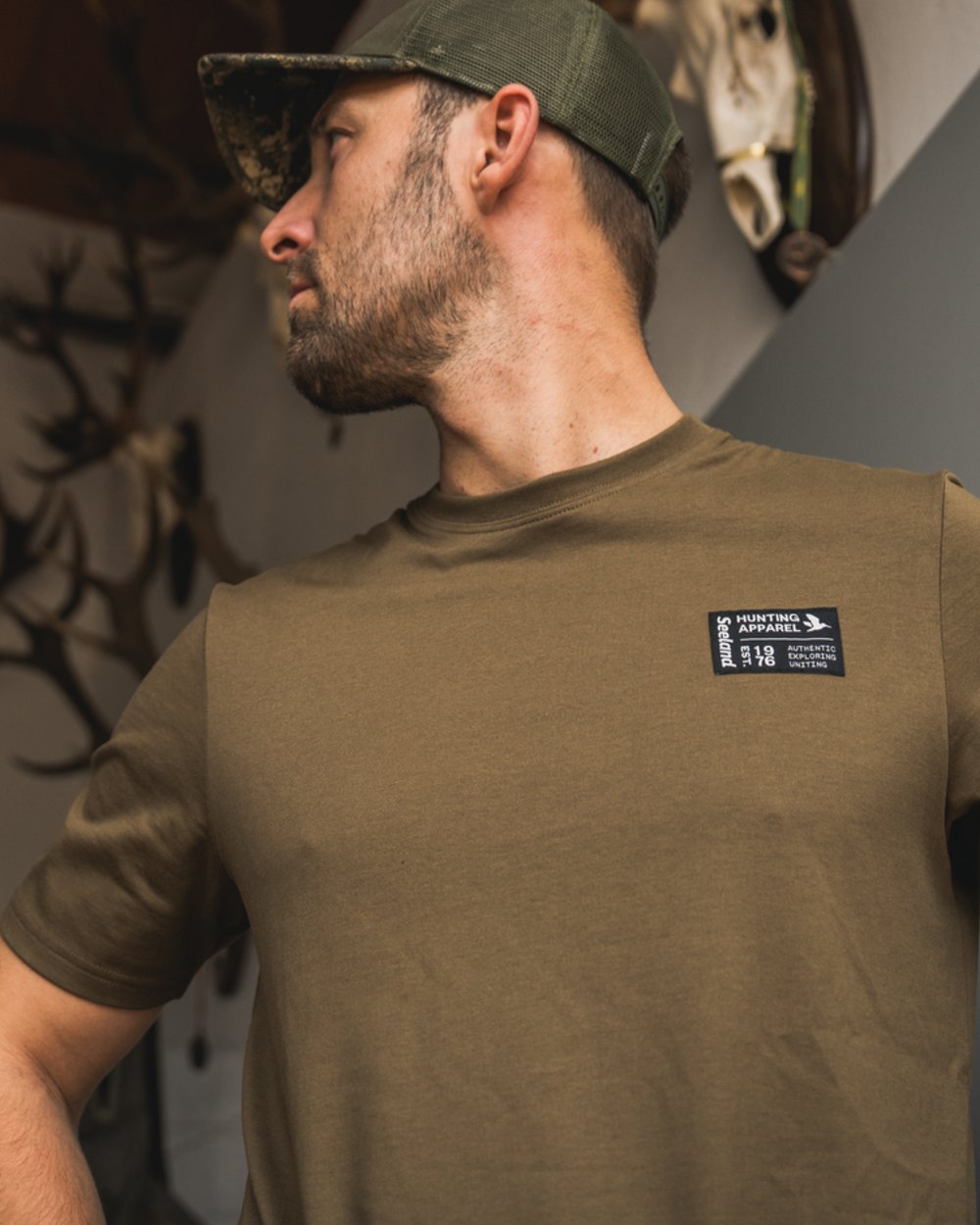 Military Olive Coloured Seeland Striker T-Shirt on indoor background 