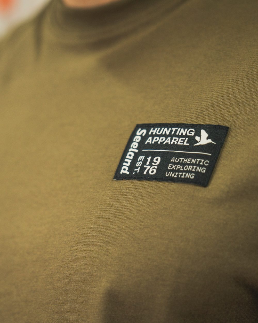 Military Olive Coloured Seeland Striker T-Shirt on indoor background 
