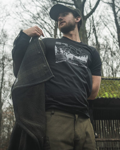 Black coloured Seeland Territory T-Shirt on forest background 