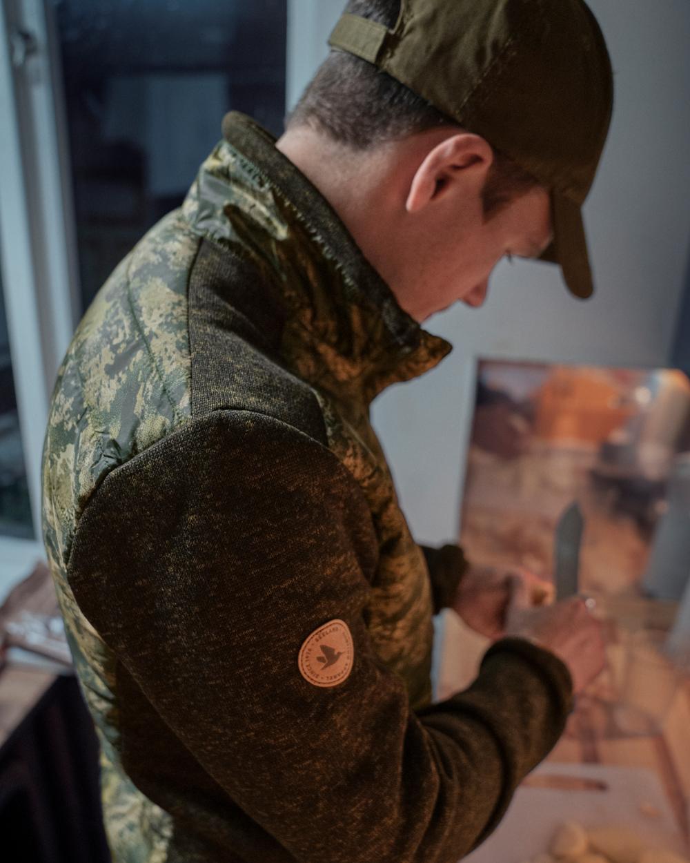 Camo Coloured Seeland Theo Hybrid Jacket on indoor background 