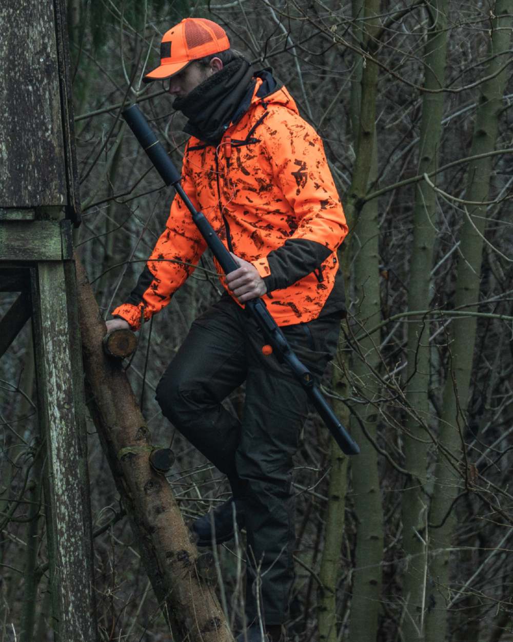 Orange Blaze InVis MPC coloured Seeland Trax Blaze Jacket on forest background 