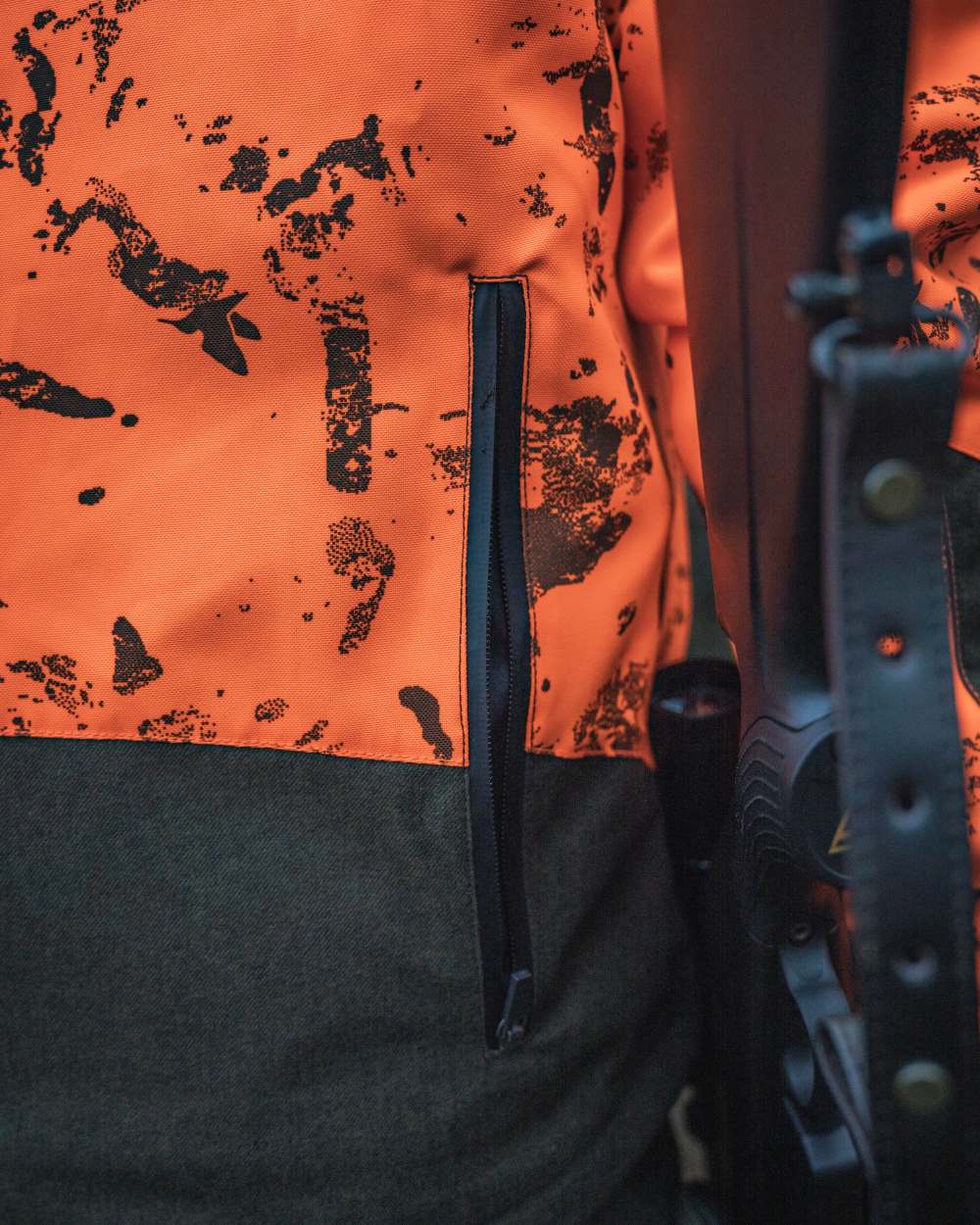 Orange Blaze InVis MPC coloured Seeland Trax Blaze Jacket on forest background 