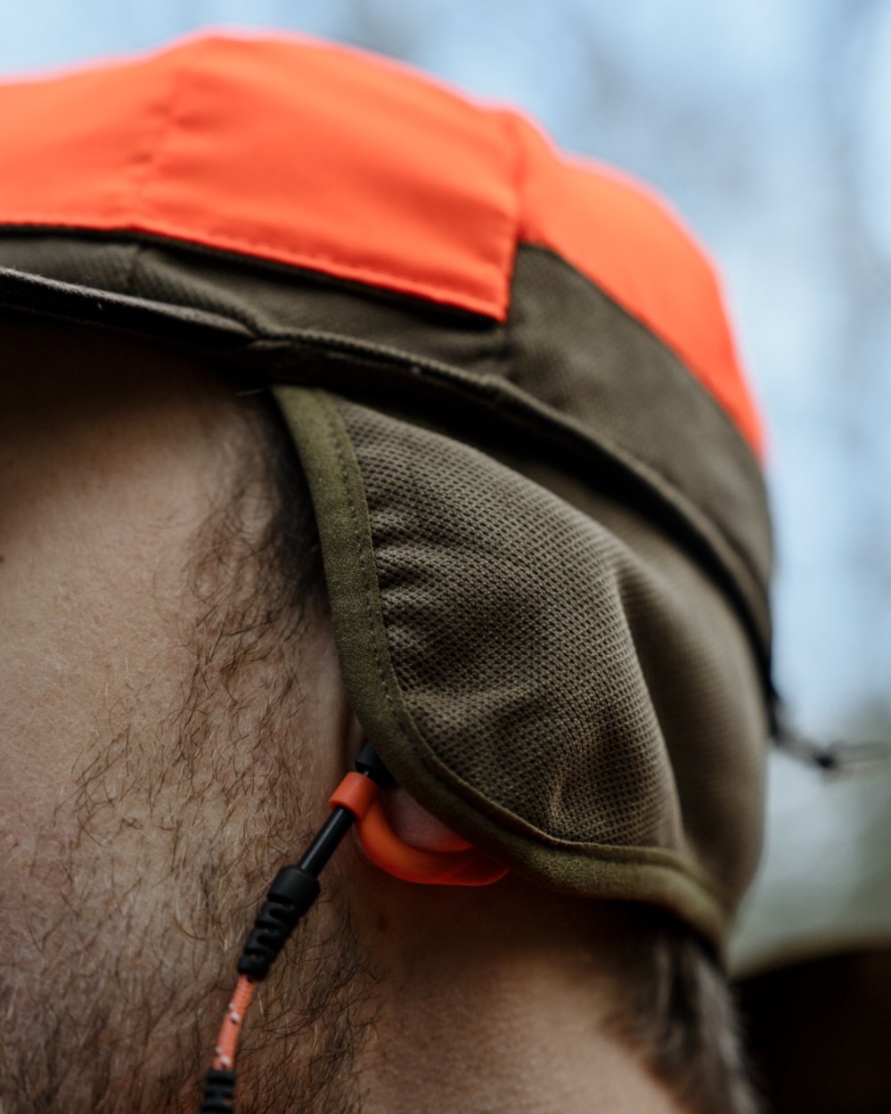 Grizzly Brown coloured Seeland Ultimo Cap on forest background 