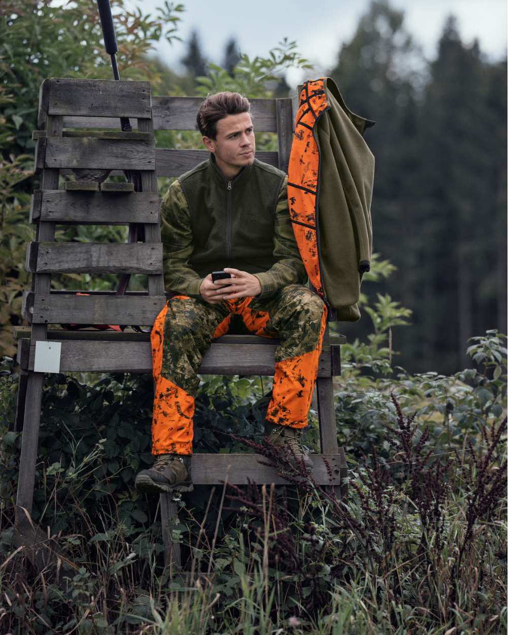 InVis Green InVis Orange Blaze Coloured Seeland Vantage Trousers on forest background 