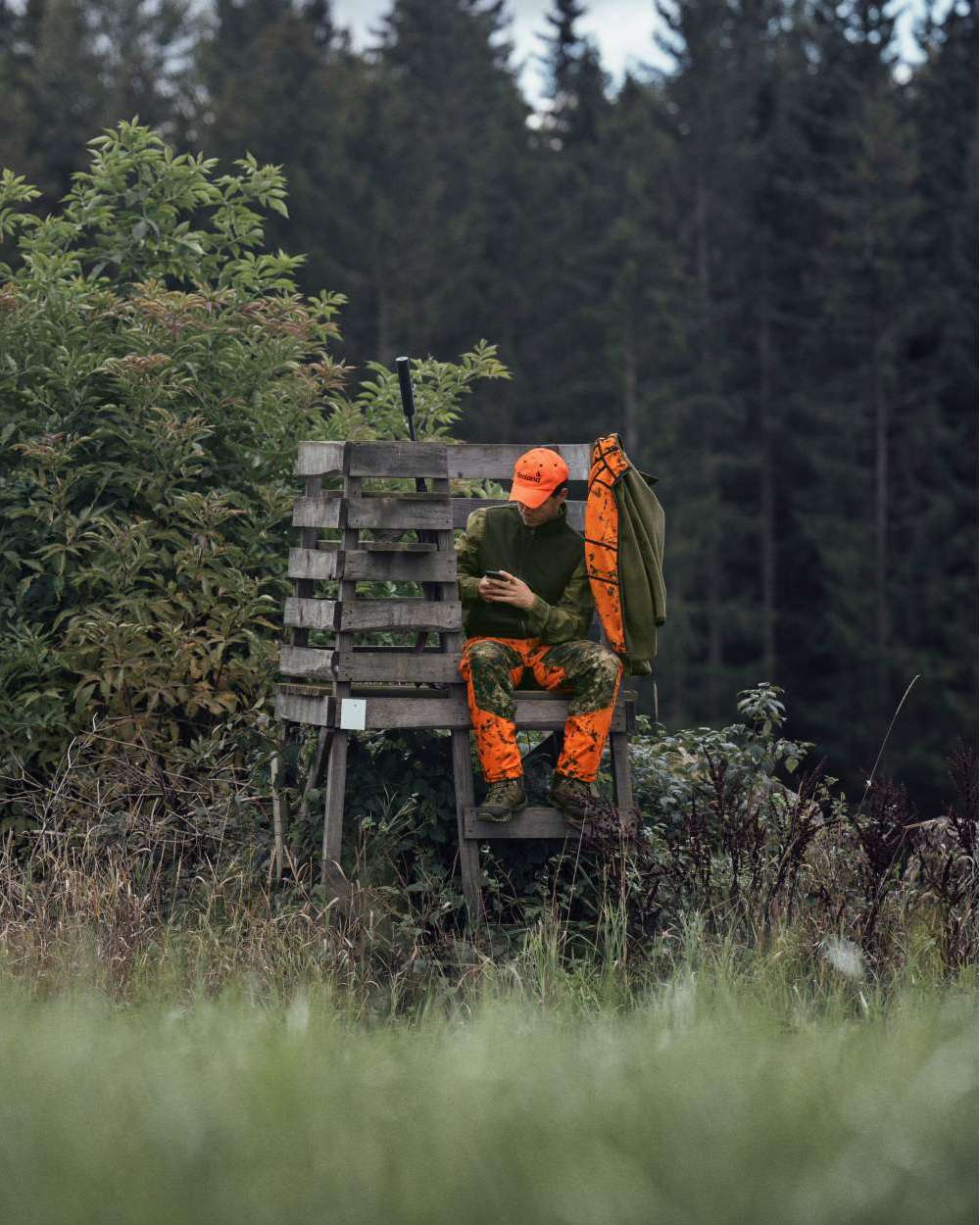 InVis Green InVis Orange Blaze Coloured Seeland Vantage Trousers on forest background 