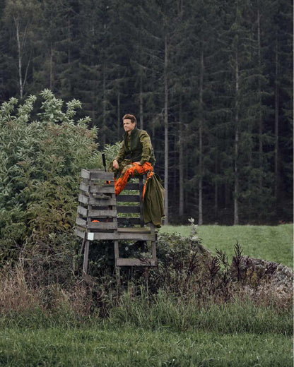 InVis Green InVis Orange Blaze Coloured Seeland Vantage Trousers on forest background 